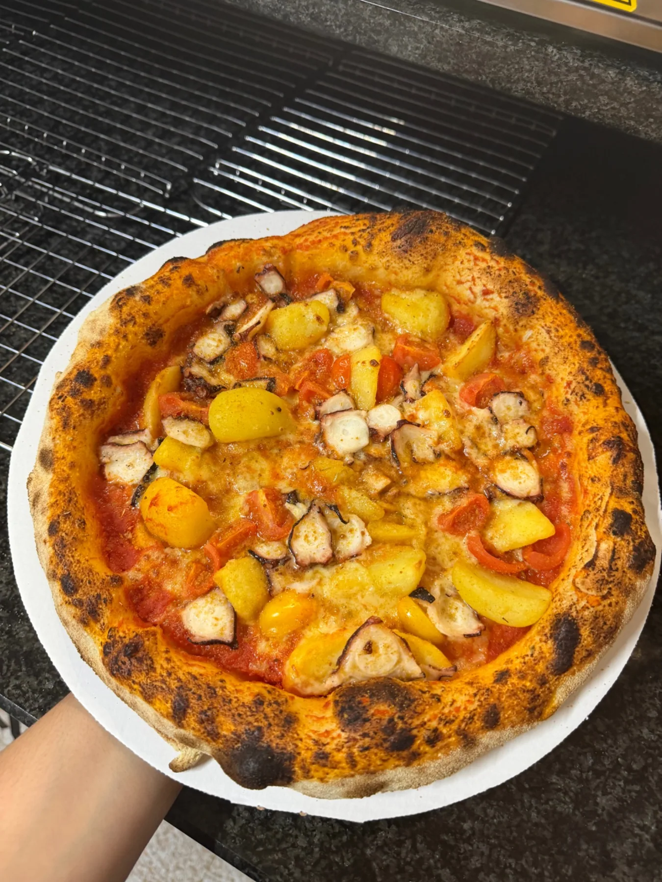 Pizza con ingredienti del mare